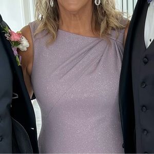This is a mother of the groom dress, worn one time. Light lavender color